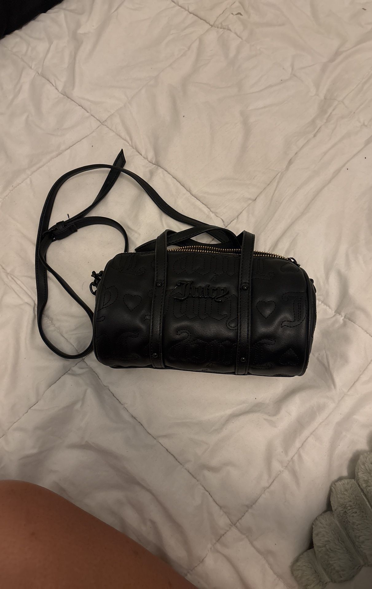 Black “Juicy Couture Women’s Puff Roll Crossbody Bag”