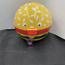The Sun Squad Hamburger BBQ Grill Condiment Caddy is a 32" round and 11" tall plastic container designed to hold condiments while grilling. The multi-