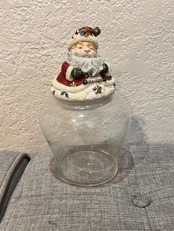 Vintage Santa Claus-themed glass jar with a ceramic lid