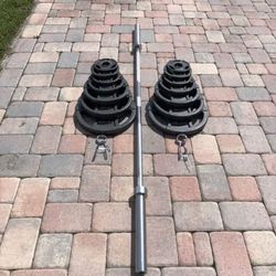 300lb Olympic weight set with barbell and clips