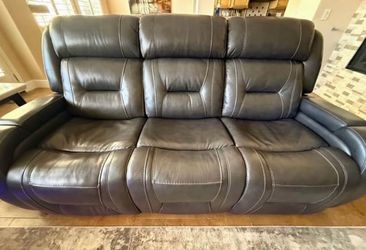 Charcoal Leather Reclining Couch and loveseat with usb charging, console & floor blue lights