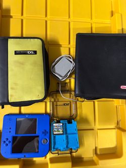 Nintendo 2DS handheld console games super mario bros mariokart 7 video game