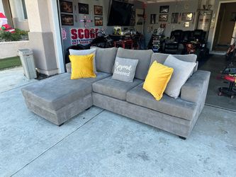 Absolutely perfect condition gray sectional couch !!