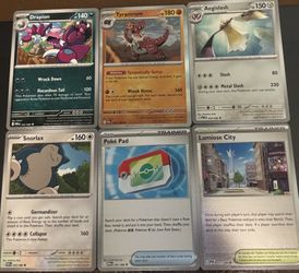 Poké Pad And Drapion Or 22 Random Pokemon Cards