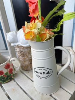 Farmers market pitcher watering can