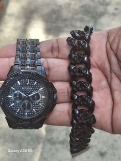 Bulova men's watch and stainless steel bracelet