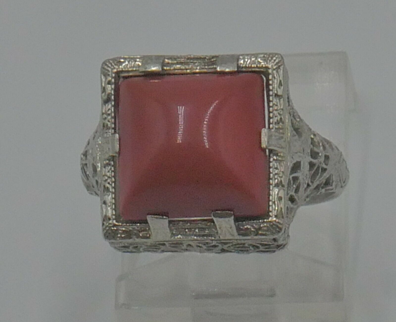 14kt white gold filigree  ring with princess cut coral stone 3 grams size 4.5 . mint condition. 862556-3.