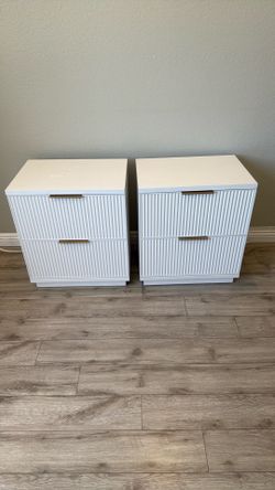 White bedside tables