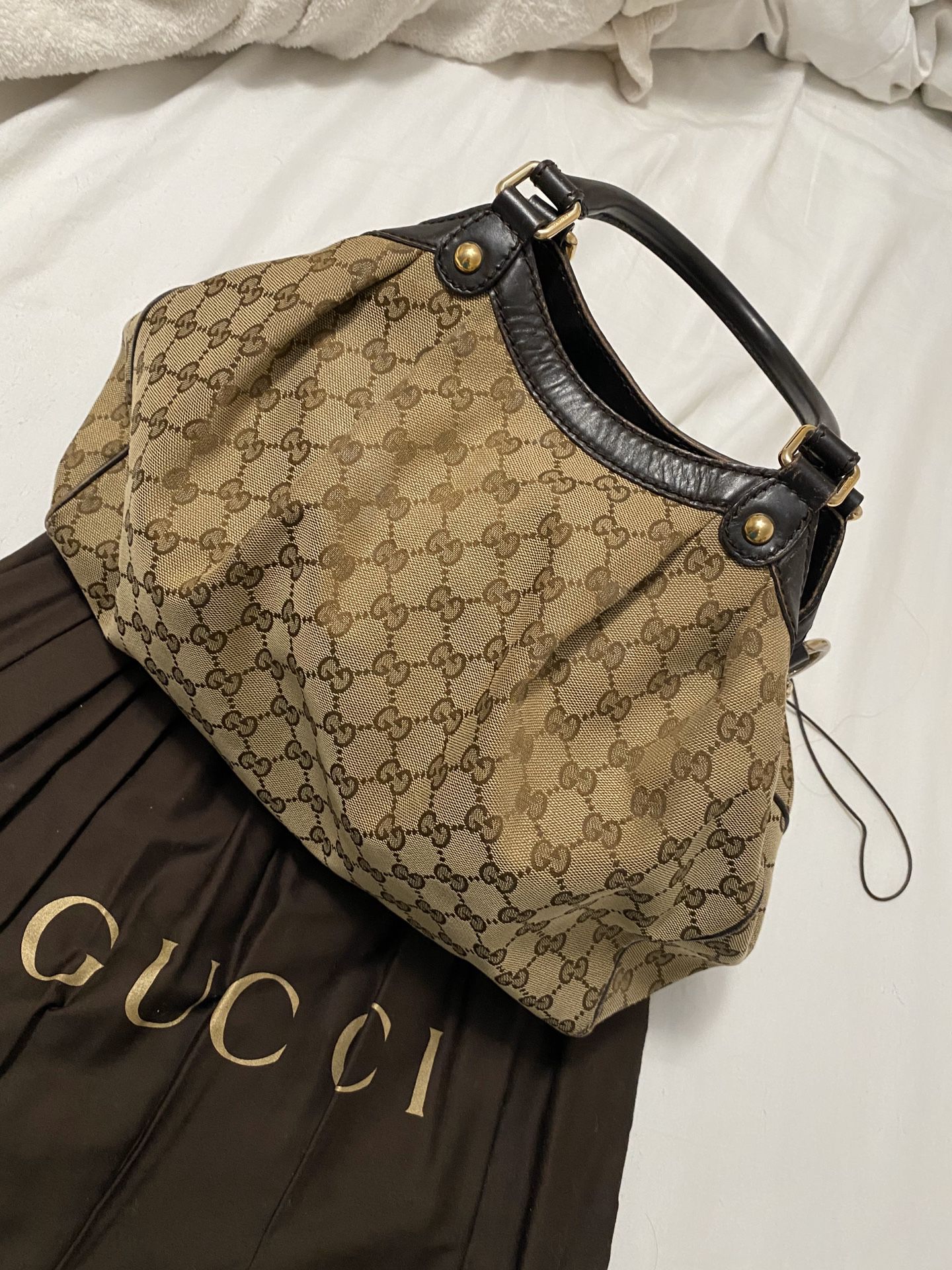 Gucci bag Authentic with dust bag 😍 no rips. Just some light stains inside.