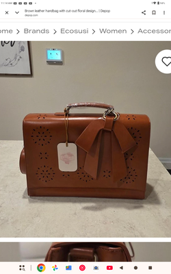 Very nice purse take a look at all the pictures and then read the description below