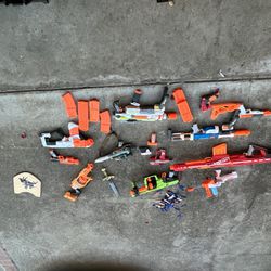 Bunch Of Nerf Guns And Swords 