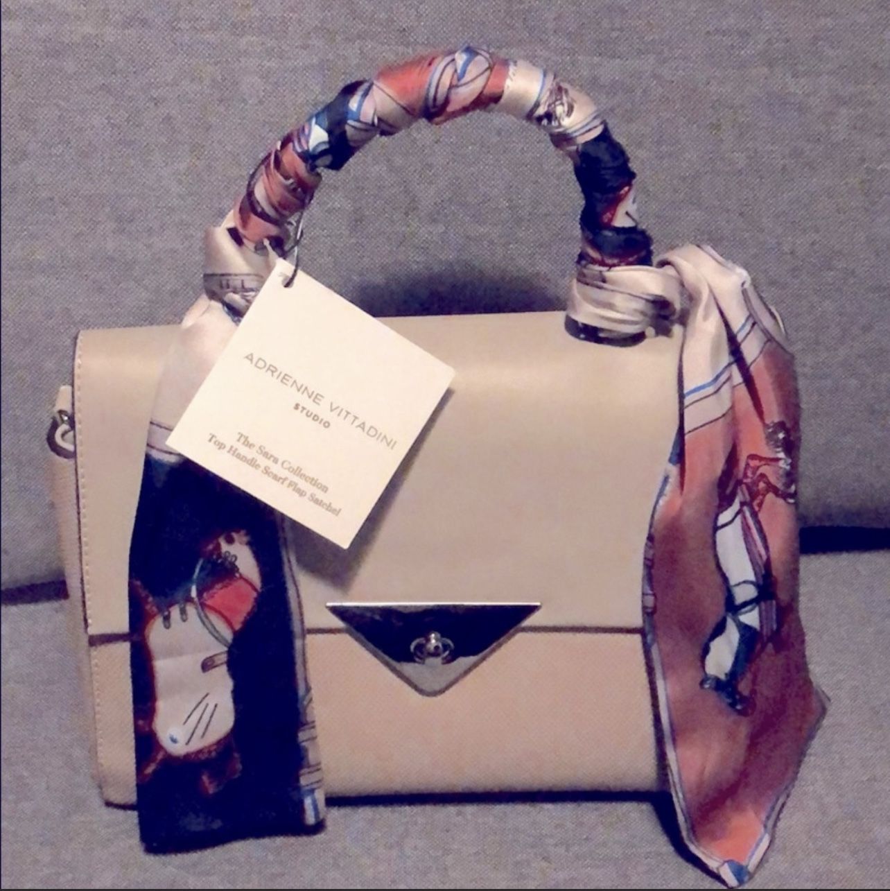 Brand new w/ tag Adrienne Vittadini purse w scarf and it had an extra cross body handle