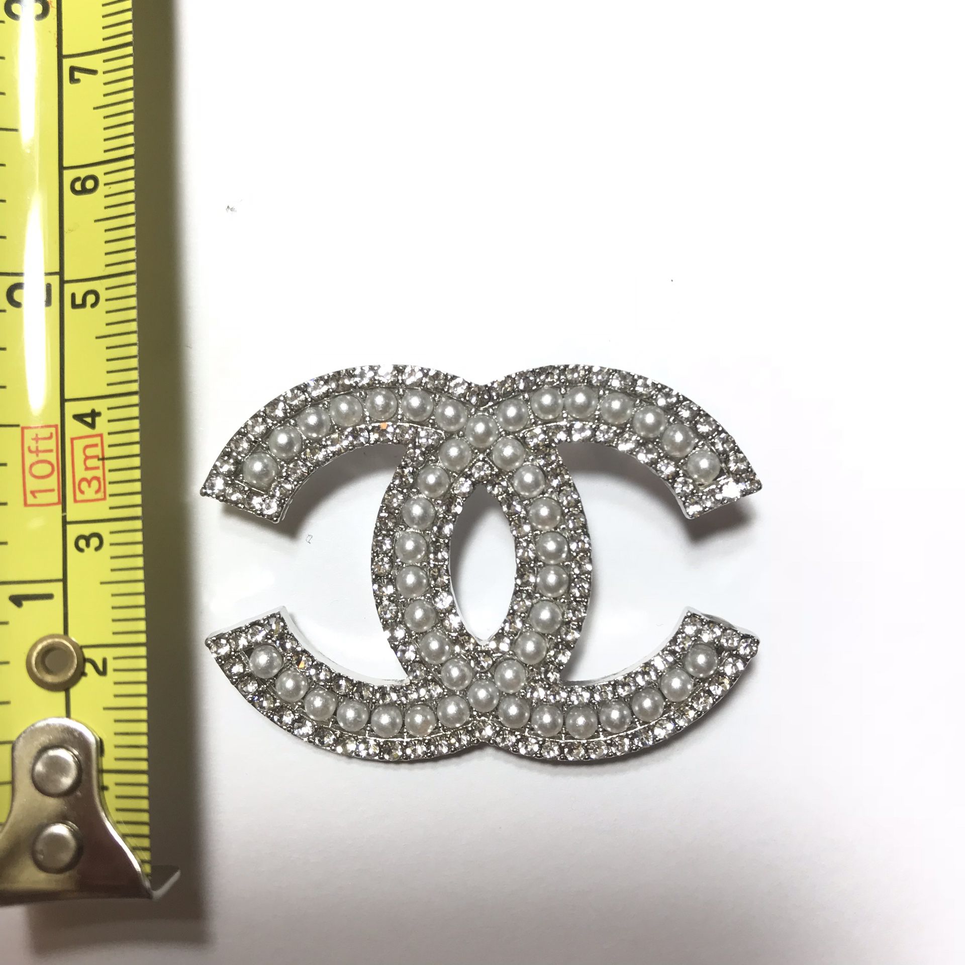 Sold at Auction: Chanel VIP No. 5 Brooch (w/box)