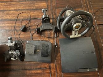 PS3 with one controller and PXN racing wheel, pedals, and mounting stand
