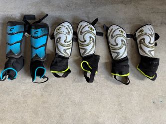Three pairs of soccer cleats