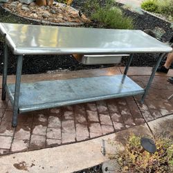 Stainless Table W/ Pull Out Drawer And Second Shelf 