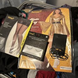 Extra large costume, fishnet, stockings, glitter, lashes, heart earrings