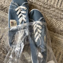Denim sneakers, George Foreman, large grill, cereal, meal decorative vase, wooden bench, and slow cooker