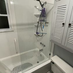 Clear glass Partial Shower Wall. 58” High, 33” Wide, 3/8” Thick Glass. With Mounting Brackets.