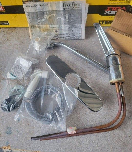 New Pfister Single-Handle Kitchen Faucet With Side Sprayer.