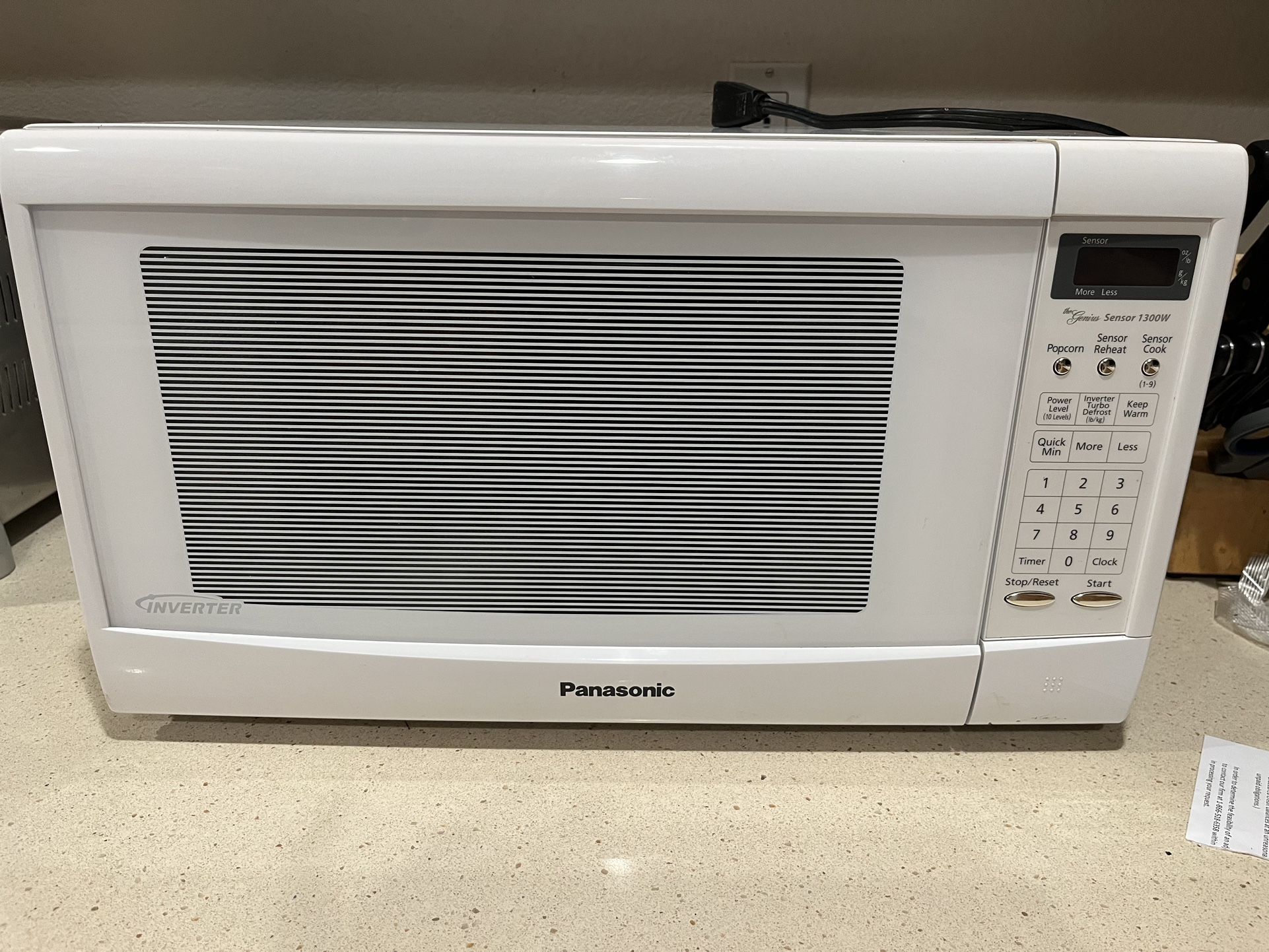 WHITE PANASONIC 12.7 AMP MICROWAVE OVEN MODEL # NN-SN667W ( 20 1/2” LONG x 14 1/2” WIDE x 12” HIGH)