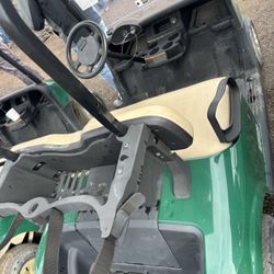 Two Club Carts And One EZGO 