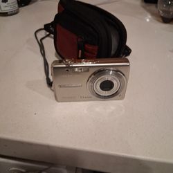 OLYMPUS FE-230.      7.1 MEGAPIXEL