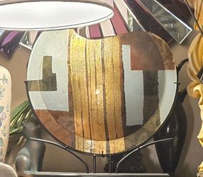 Glass vase with stand.