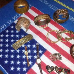 I have a collection of old antique bracelts for women as you can see nice beautiful hair clips matche set watches .