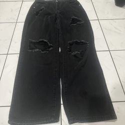Woman’s Distressed Black Denim Jeans