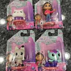 Dreamworks Gabby Dollhouse Lot of 4 figures.  Also can be used as cake Toppers.  Tallest is approximately 3 inches tall.  Brand new factory sealed.  S