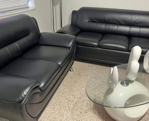 Set of 2 black sofas