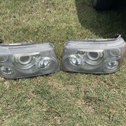 2006 UP 2009 SET OF LAND ROVER HEADLIGHT 