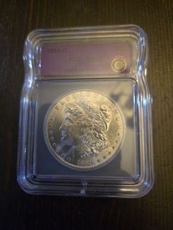 1884 O ICG MS 63