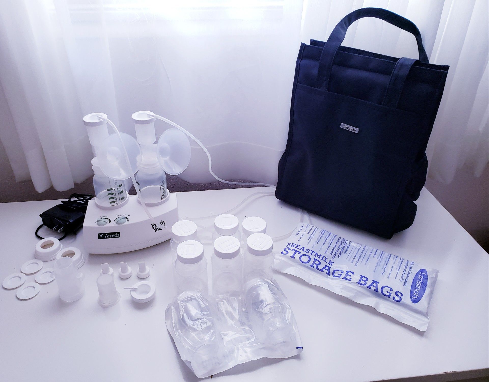 Ameda Purely Yours breast pump ( and accessories)