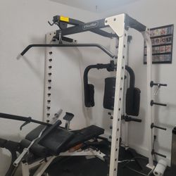 Has Pull Down,and Butterfly Pads Are Taped .and Bench.,curl Bar