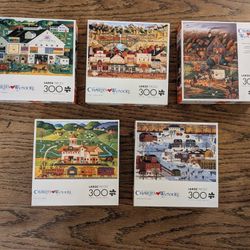 Charles Wysocki 300-Piece Puzzles…$20 for all.  Guarantee no missing pieces as I’ve done them.  $20 for all 5.  Porch pickup.  Also open to trade.