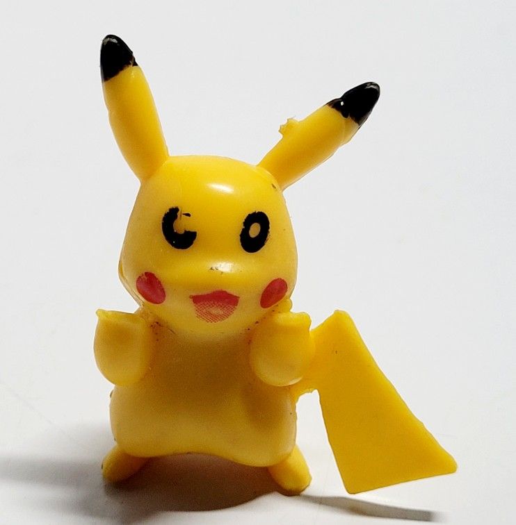Tomy Nintendo Pokemon Pikachu 1" Micro Miniature Pocket Portable Action Figure Only. No accessories included. Pikachu is a fictional creature known as