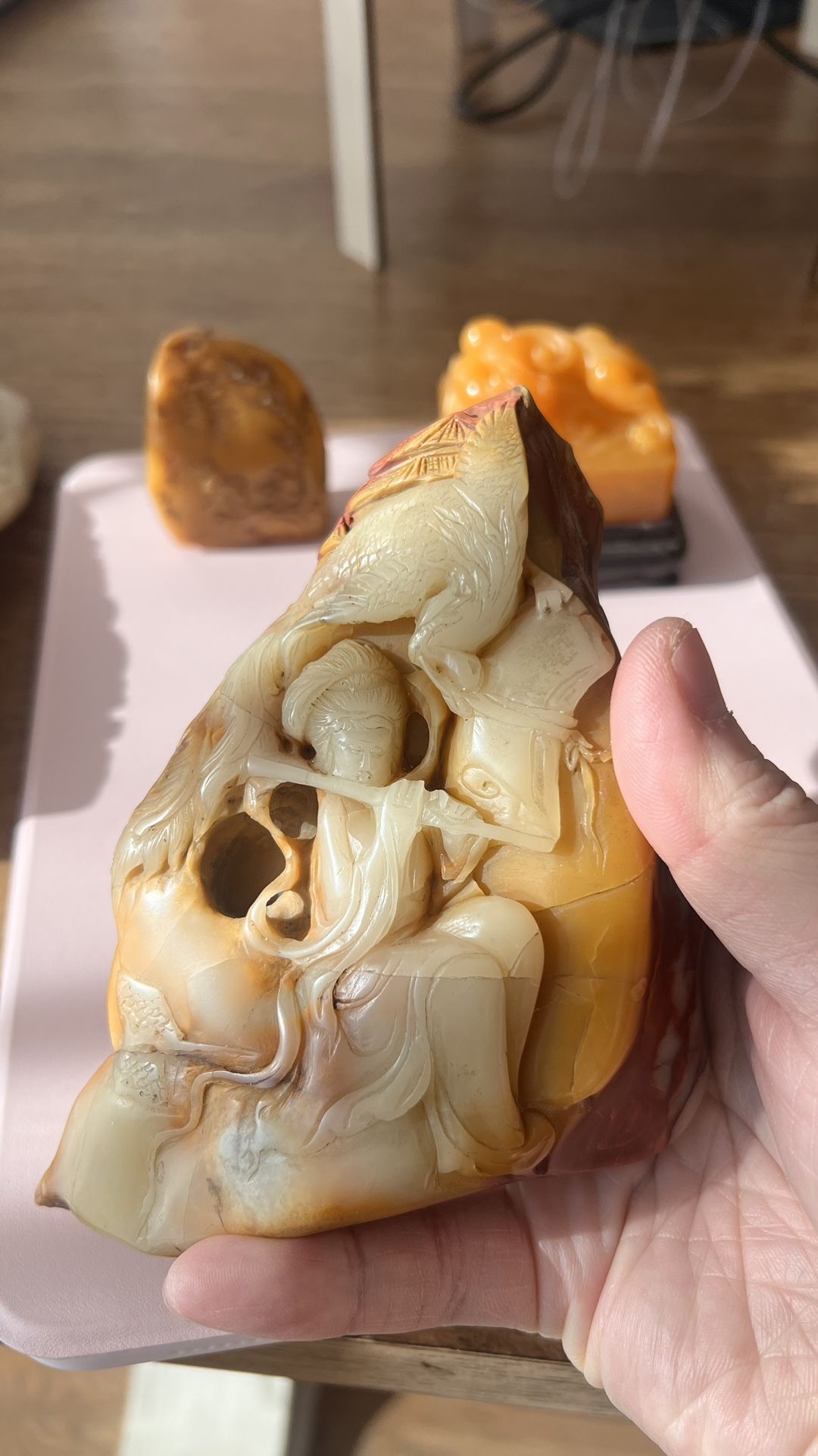 This Chinese Antique Jade stone carving is finely crafted with a smooth, jade-like texture and natural color transitions. It depicts an elegant lady p