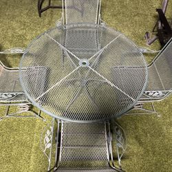 Patio Table And 4 Rocking Chairs 