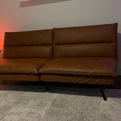 Tan/brown futon sofa
