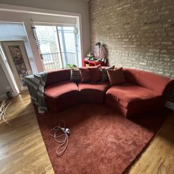 Couch rug and picture in the back