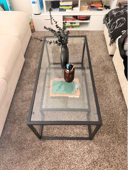 medium sized rectangular glass coffee table