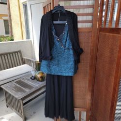 J. R. Nites Top By Caroline Comes With a Jacket and skirt