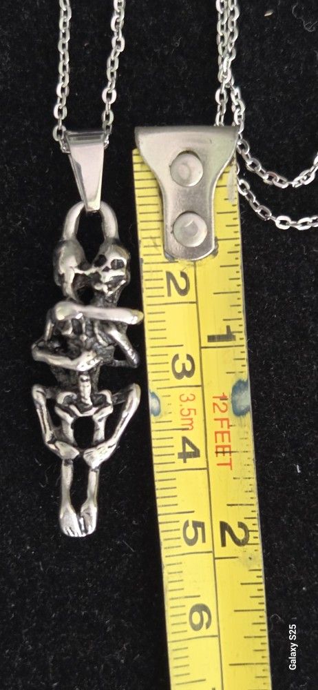 Embracing Skeletons Pendant Necklace 