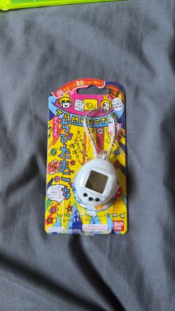 Bandai tamagotchi first gen white pet