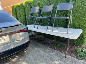 8 foot Plastic Table and 3 chairs