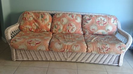 Rattan sofa and chairs with ottoman