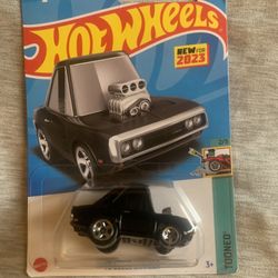 Black 1970 Dodge Charger Hot Wheels diecast car #HotWheels #DiecastCars
