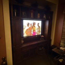 Ashley TV niche. Will fit up to a 60 inch TV